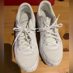Women’s size 9 Nike sneakers. Two small flaws that are shown in pictures.